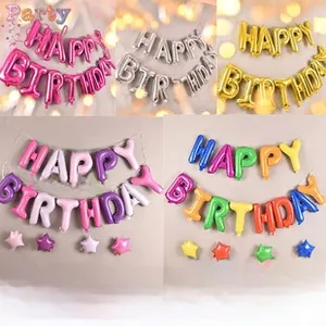 Detail view of colorful metallic HAPPY BIRTHDAY letter balloons and star decorations