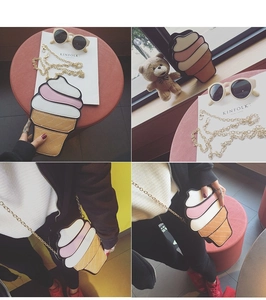 Close-up of creative ice cream cone shoulder bag with pink quilting and metal chain