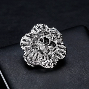 Silver hollow flower brooch with detailed relief texture for fashion clothing accessories