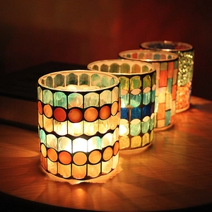 European mosaic glass candle holders with colorful geometric patterns for dining decor