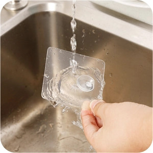 Transparent adhesive wall hook for kitchen and bathroom showing strong waterproof feature