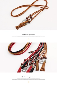 Detail view of handmade braided tassel waist chain with wooden beads and metal charms