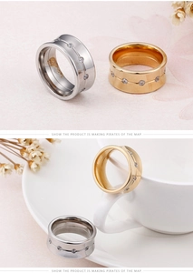 Close-up of 10mm gold and silver titanium steel rings with full crystal inlay detail