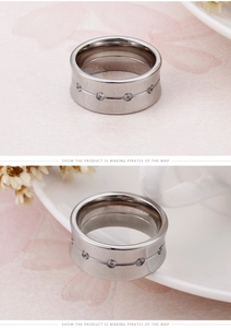 Detail view of 10mm titanium steel ring with sparkling crystals in silver finish