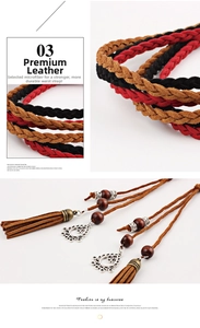 Close-up of braided microfiber belt with long tassels and vintage metal floral pendants
