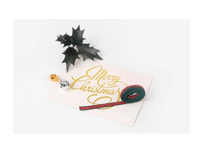 Detail view of red and green striped Christmas ribbon with festive bells and holiday cards
