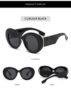 Vue détaillée des lunettes de soleil rondes rétro noires avec branches à texture gaufrée