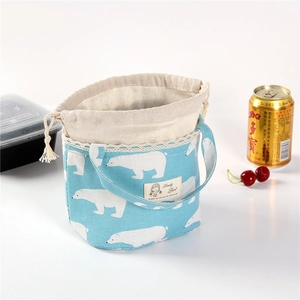 Insulated canvas lunch bag with polar bear print, lace trim and drawstring closure