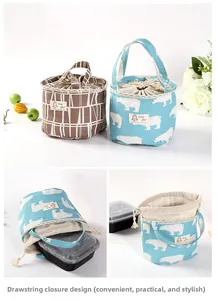 Detail of drawstring closure and cylindrical interior of canvas insulated lunch bag