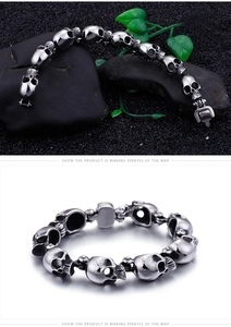Macro view of realistic vintage silver skull link bracelet with gothic metal clasp