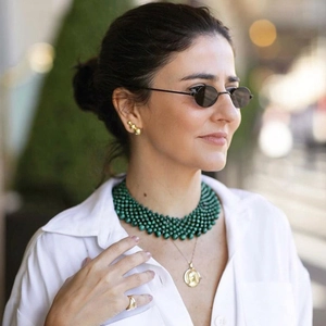 Vintage oval steampunk sunglasses with green beaded necklace and gold jewelry set