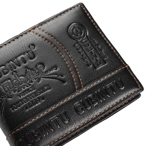 Close-up of black genuine leather wallet with orange stitching and embossed texture