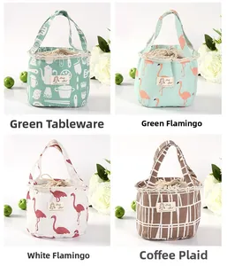 Detail view of four linen lunch bags with drawstring closure and Lovely Girl logo