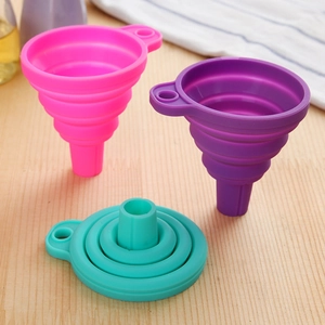 Collapsible silicone funnel set in pink, purple, and green colors for kitchen use