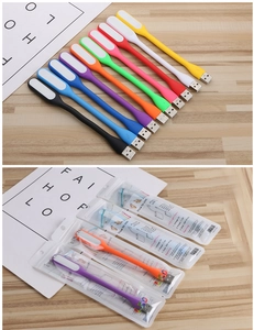 Detailed view of colorful mini USB LED lights in multiple colors and bulk packaging