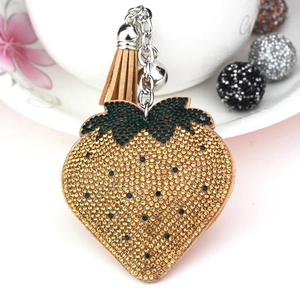 Glittering strawberry charm with tassels and crystals for handbags or keychains