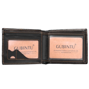 Detail of black leather bifold wallet with orange stitching and dual ID card slots