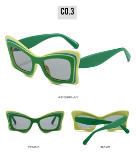Vue sous trois angles de lunettes de soleil papillon avant-garde à couches tricolores