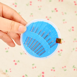 30 assorted sewing needles in a blue round disk case for home repairs and DIY crafts