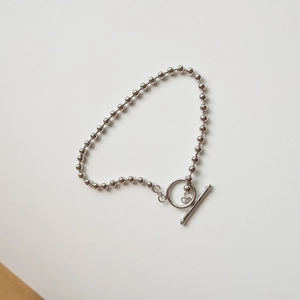 Minimalist S925 sterling silver bead bracelet featuring a classic OT toggle clasp design