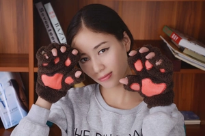 Detailed view of plush cat paw fingerless gloves featuring soft pink 3D palm pads