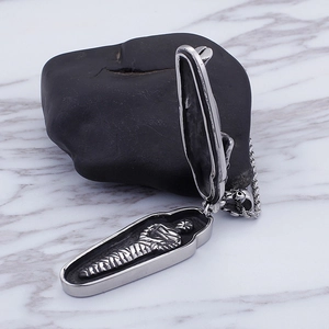 Men's vintage stainless steel coffin pendant necklace with hidden mummy detail inside