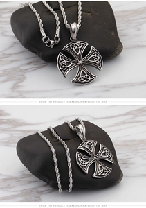 Macro view of vintage silver Celtic knot cross pendant with twisted rope chain necklace