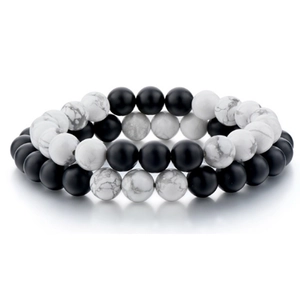 Set of 8mm matte black agate and white howlite beaded bracelets with a marble texture