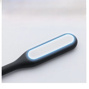 Close-up of the USB LED night light featuring a matte black soft light diffuser cover