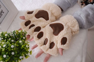 Detail of plush cat paw fingerless gloves featuring thick faux fur and ribbed cuffs