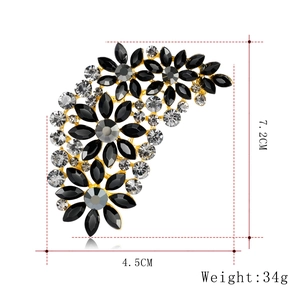 Elegant crystal feather brooch in gold finish with size and weight measurements