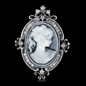 Vintage cameo brooch with crystal rhinestones and silver-toned openwork frame