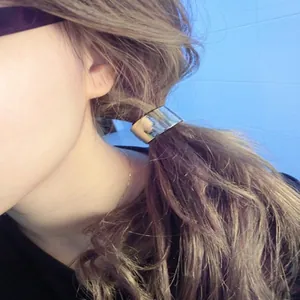 Sleek silver metal ponytail cuff hair ring with minimalist C-shape design for women