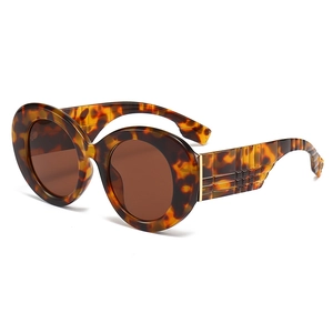 Lunettes de soleil rondes rétro écaille de tortue avec branches larges et verres bruns