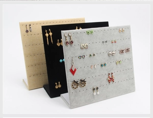 L-shape velvet and linen earring display stands showing various textures and holes