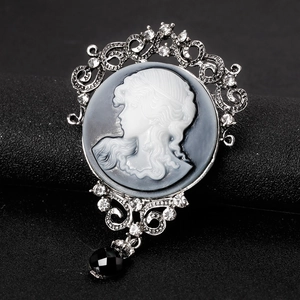 Vintage silver lady cameo brooch with sparkling crystals and black gemstone pendant