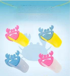 Detail view of the four color options for the crab-shaped baby faucet extender for sinks