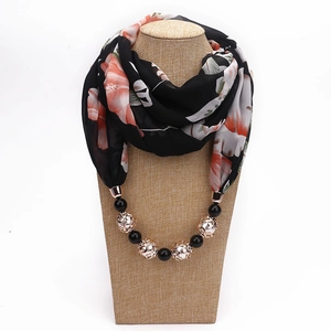 Chiffon floral necklace scarf in black with orange patterns and beaded golden accents