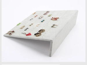Grey velvet L-shaped earring display stand with multi-hole design for jewelry storage
