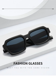 Detail shot of black rectangular fashion sunglasses S121 on white geometric display