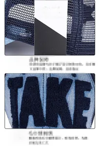 Dettaglio macro del cappello trucker in mesh blu navy con ricamo 3D TAKE in spugna