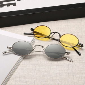 Retro oval steampunk sunglasses with slim metal frames in silver and black colors