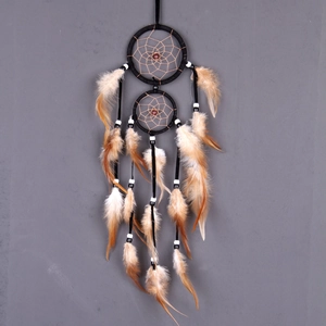 Double hoop dream catcher wall hanging with black rings and brown white feathers