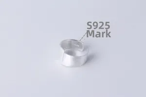 Detailed close-up of S925 sterling silver hallmark on matte brushed wide open ring