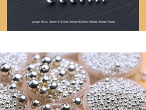 Macro detail of S925 sterling silver large hole round beads in various sizes 3mm to 7mm