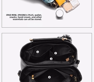 Internal view of black leather handbag showing multi-pocket storage and large capacity