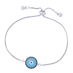 Silver adjustable evil eye charm bracelet with blue and clear crystals on a box chain