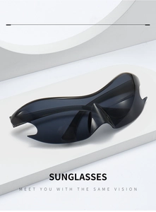 Futuristic Y2K wrap sunglasses with sharp wing details on a white geometric stand