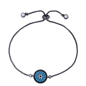 Macro detail of black plated evil eye bracelet featuring adjustable slider clasp and cubic zirconia