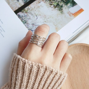 Minimalist S925 sterling silver multi-layer crisscross ring with zircon on a hand
